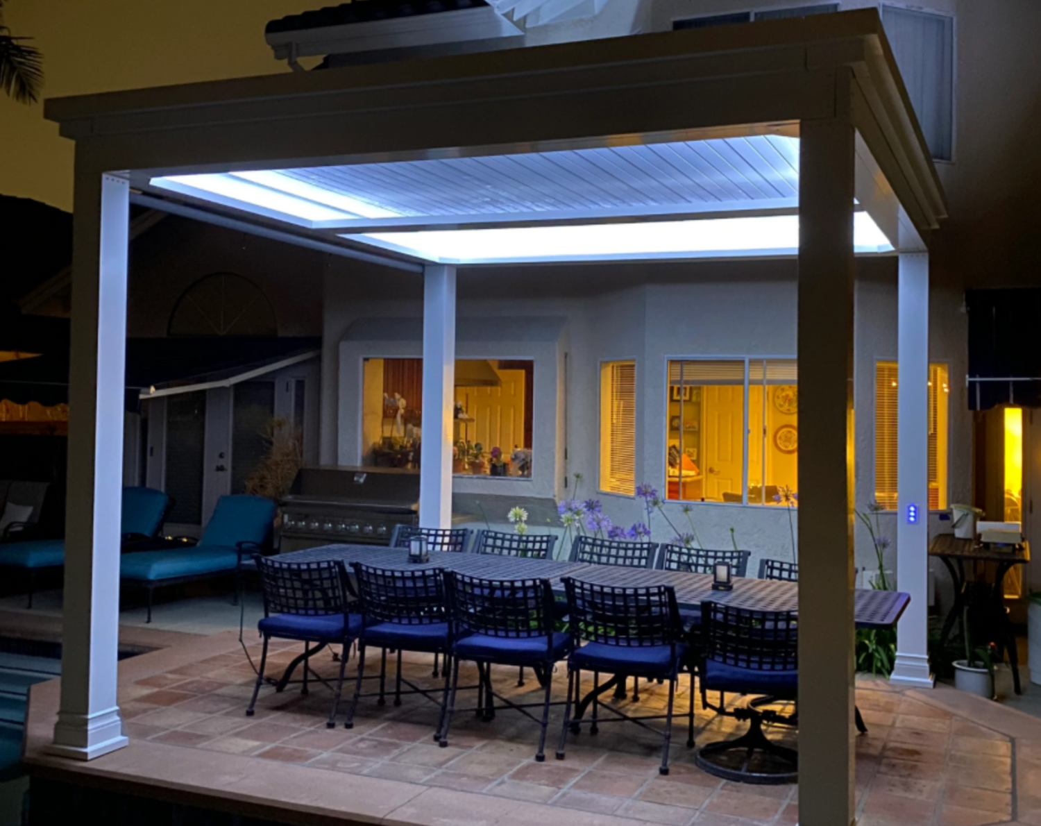 free standing luxury pergola with louvered roof with lighting