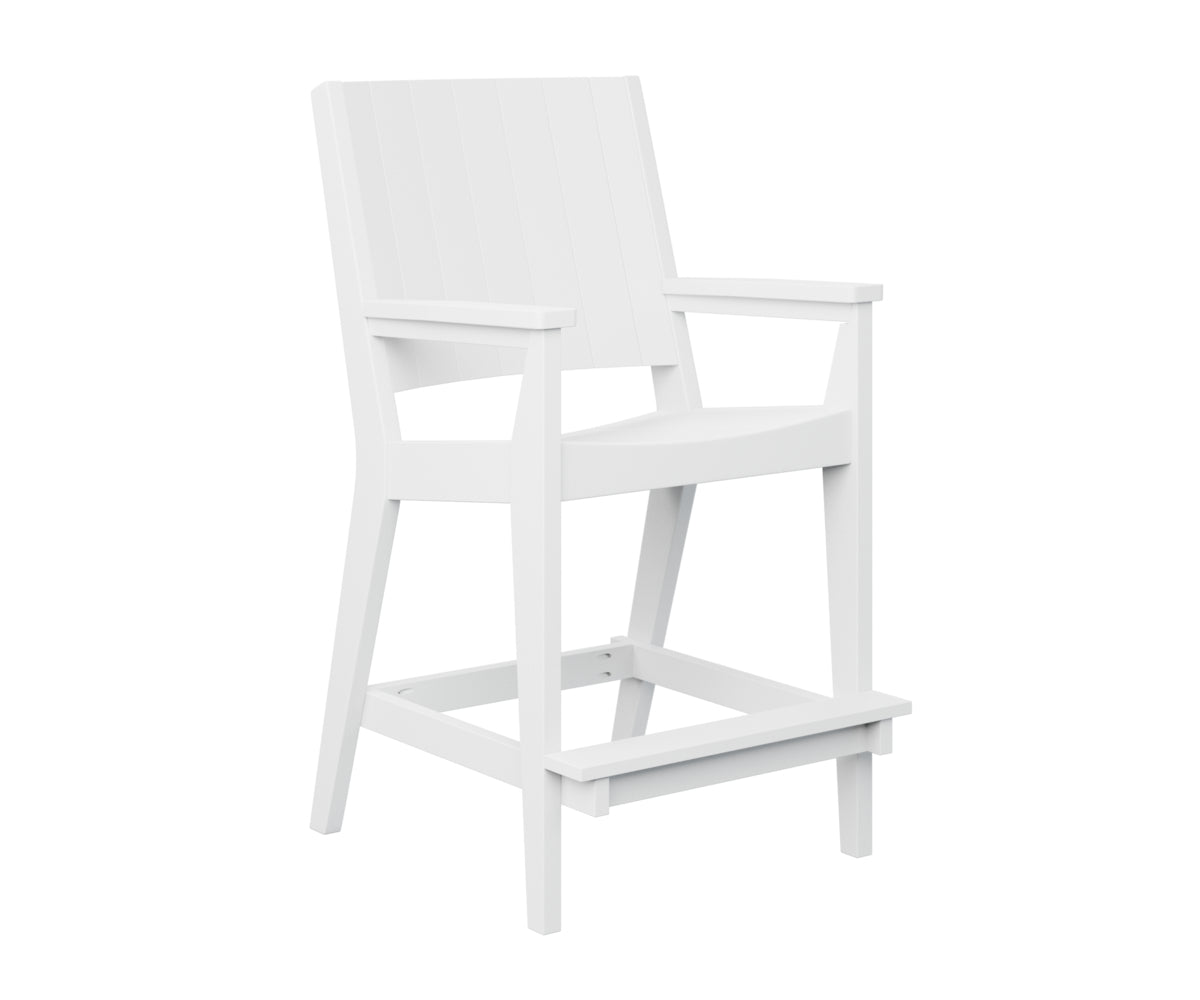 Modern outdoor lounge chair with striped cushion near fire pit