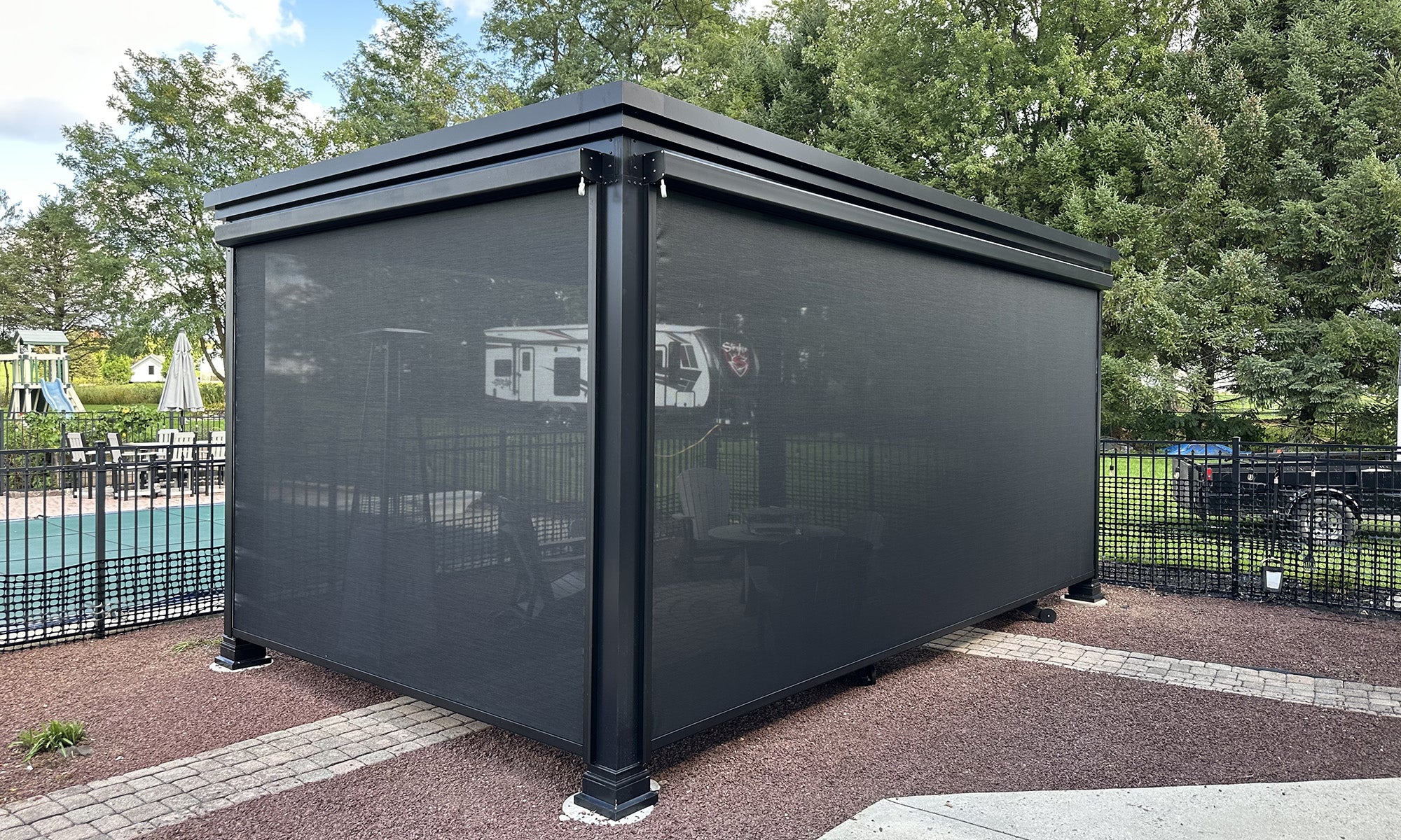 The Luxury Pergola w/ Pergola Shade Rolled Down