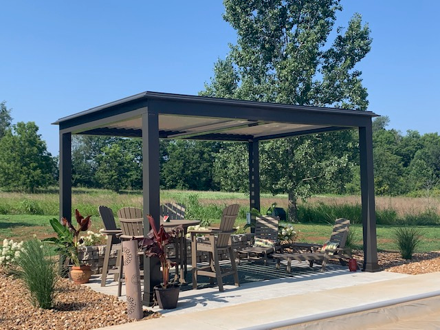 outdoor living space with free standing luxury pergola with louvered roof