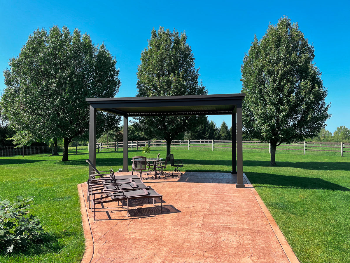 free standing luxury pergola with louvered roof on patio