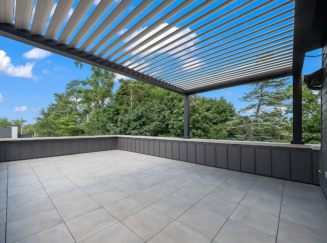 black louvered roof pergola on rooftop patio outdoor living space