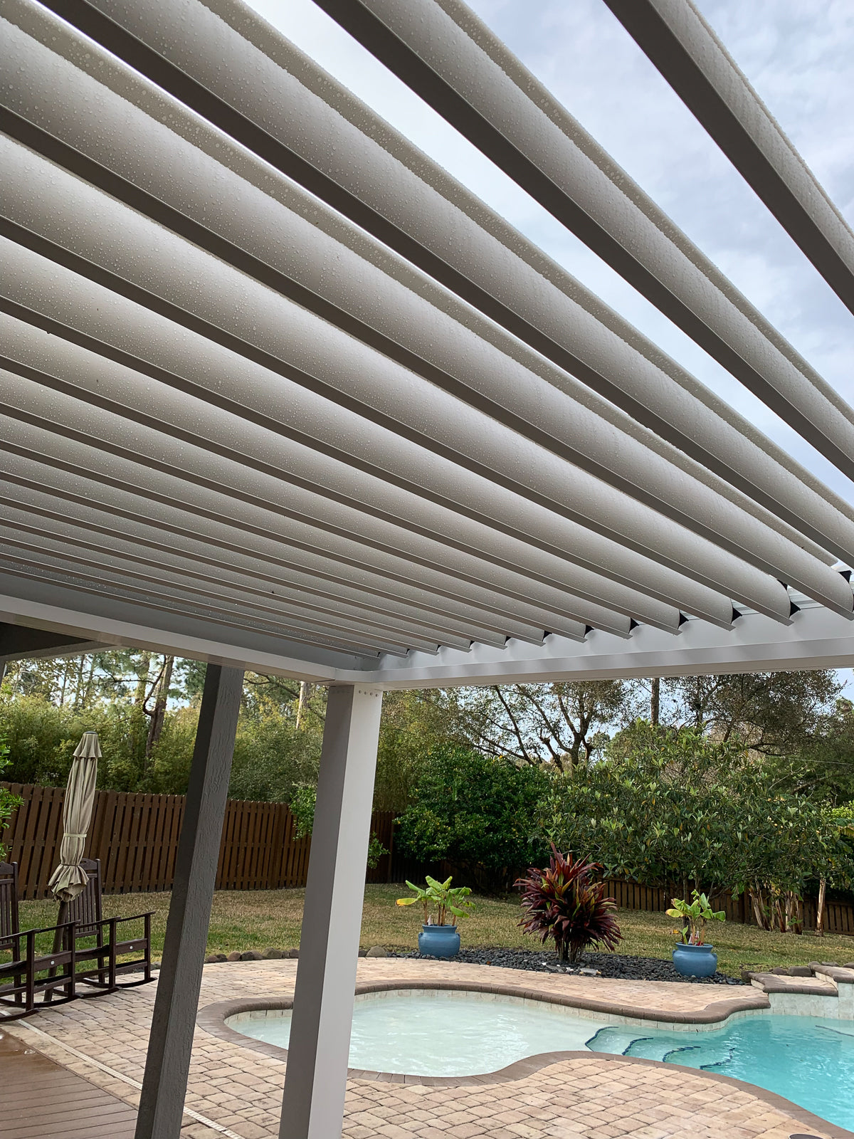 free standing luxury pergola with louvered roof pool pergola