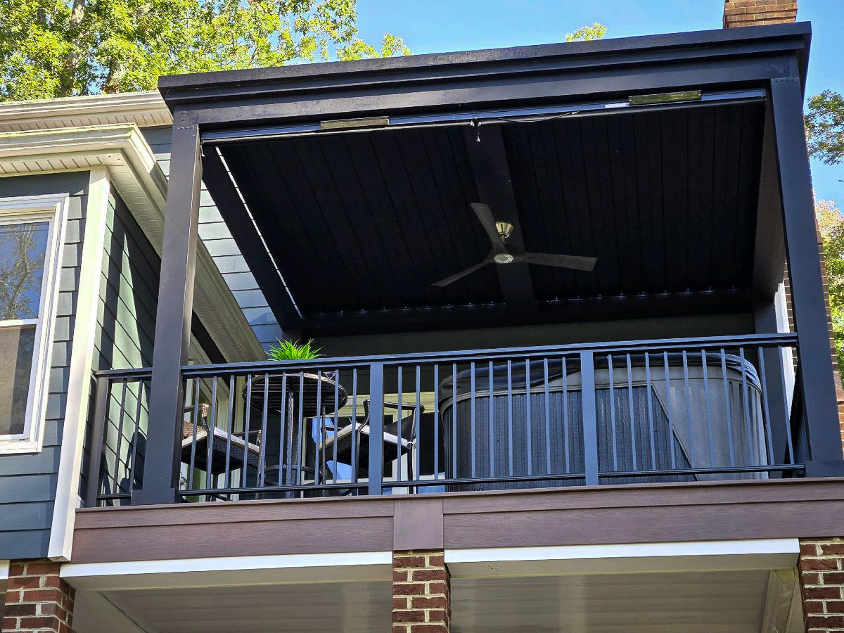 bronze luxury pergola with a louvered roof and attached fan