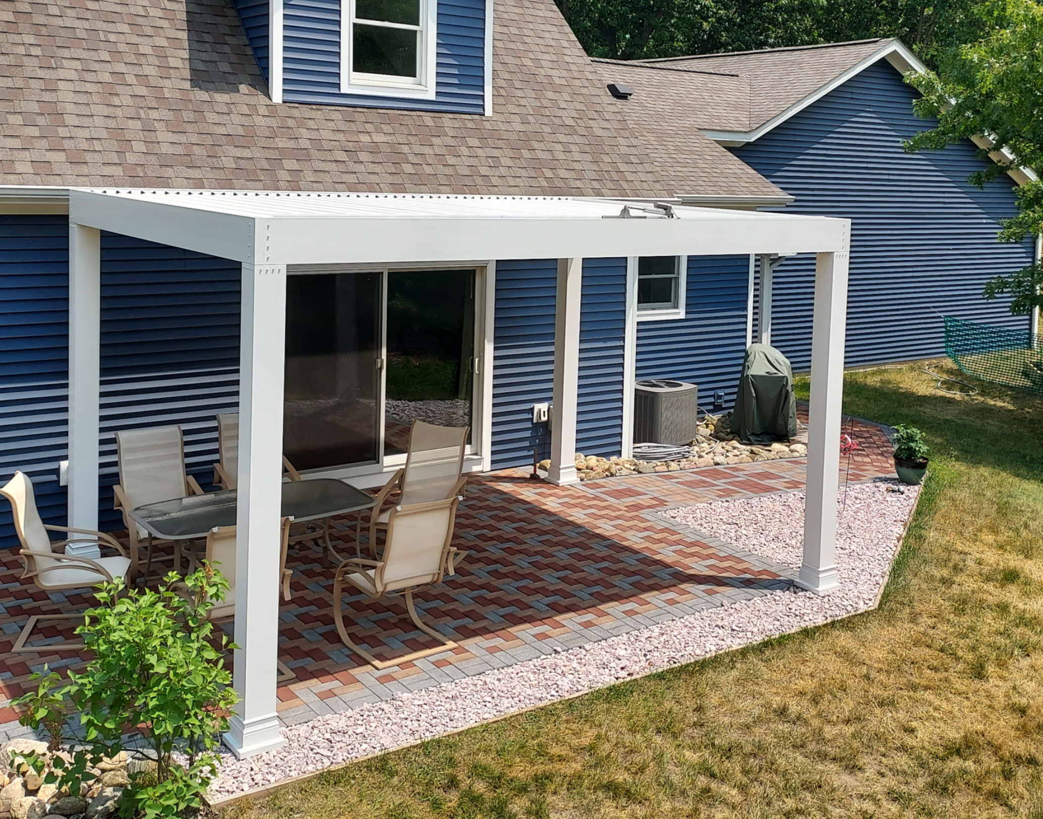 white free standing pergola structure in outdoor living space