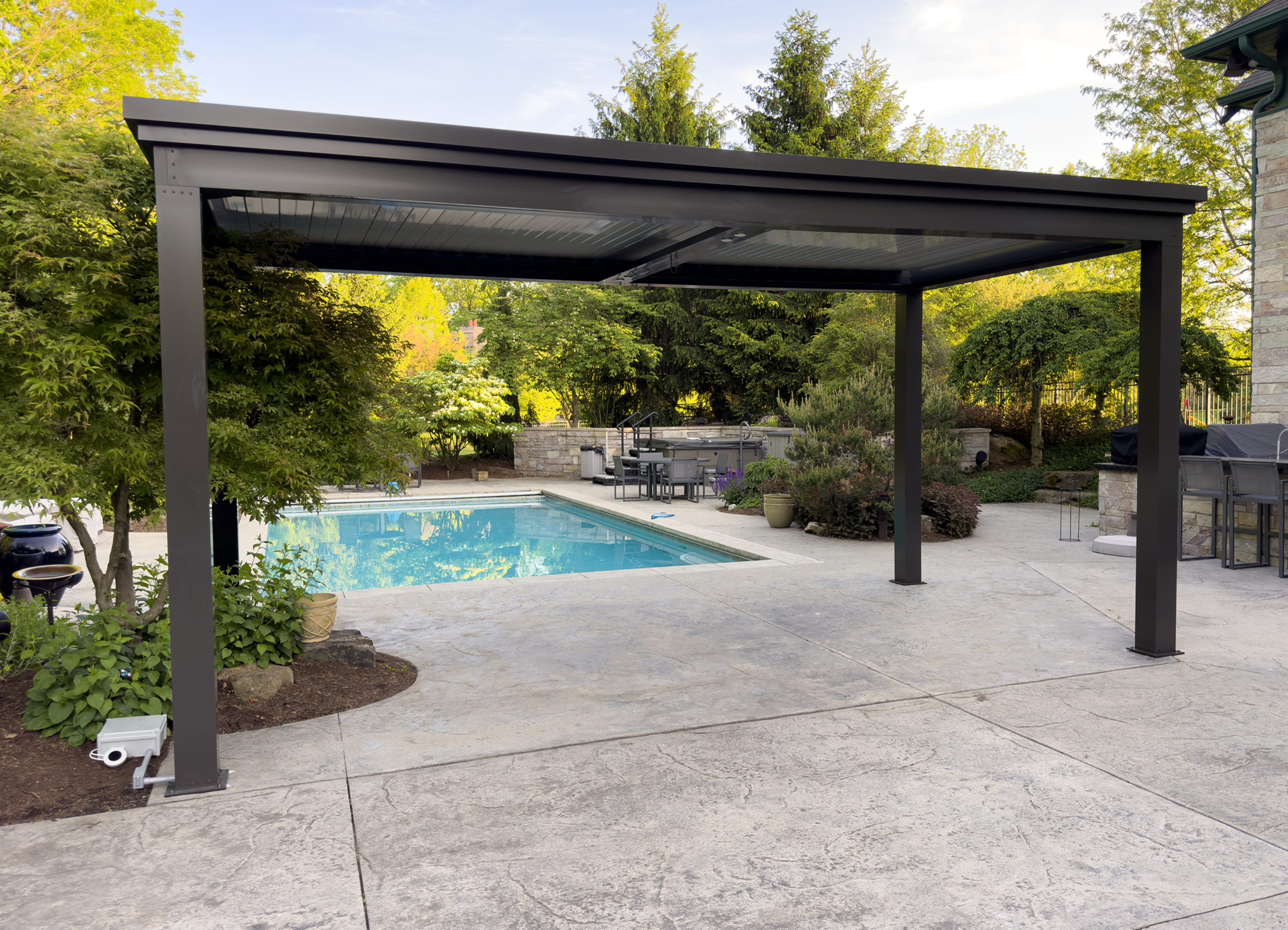 free standing luxury poolside pergola with louvered roof