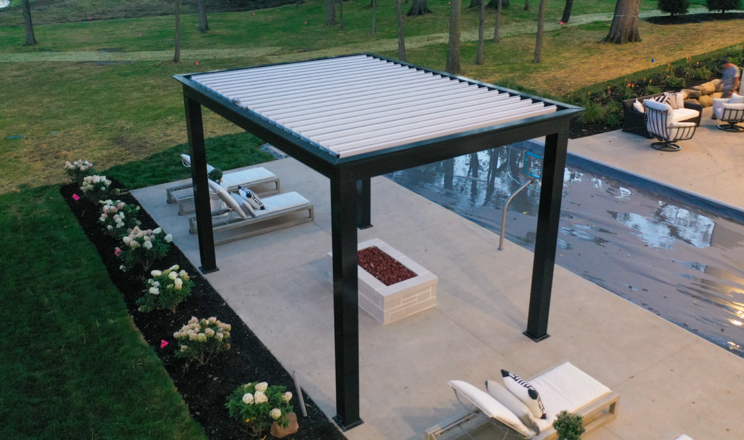 free standing luxury poolside pergola with louvered roof