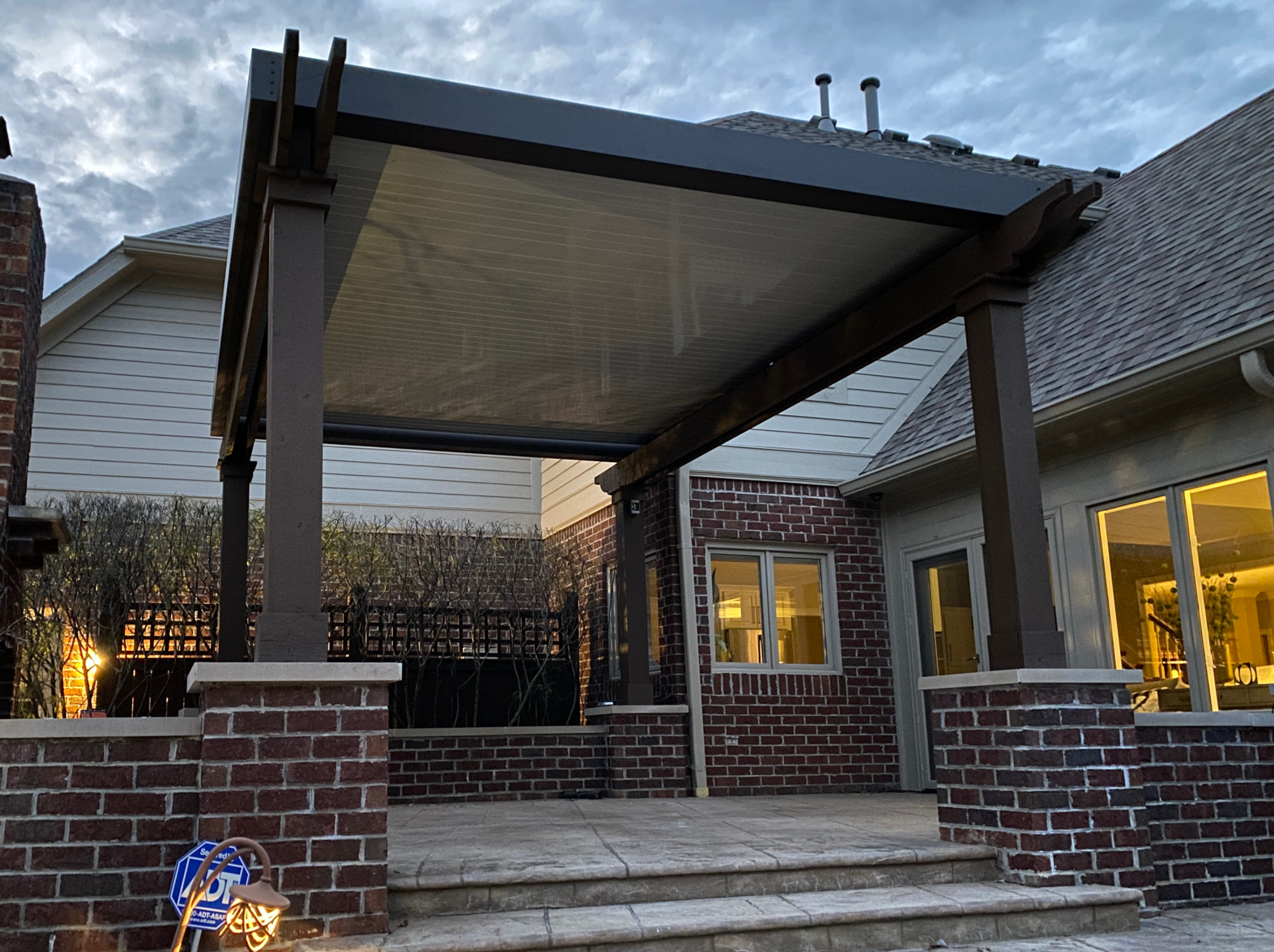 free standing luxury pergola with louvered roof