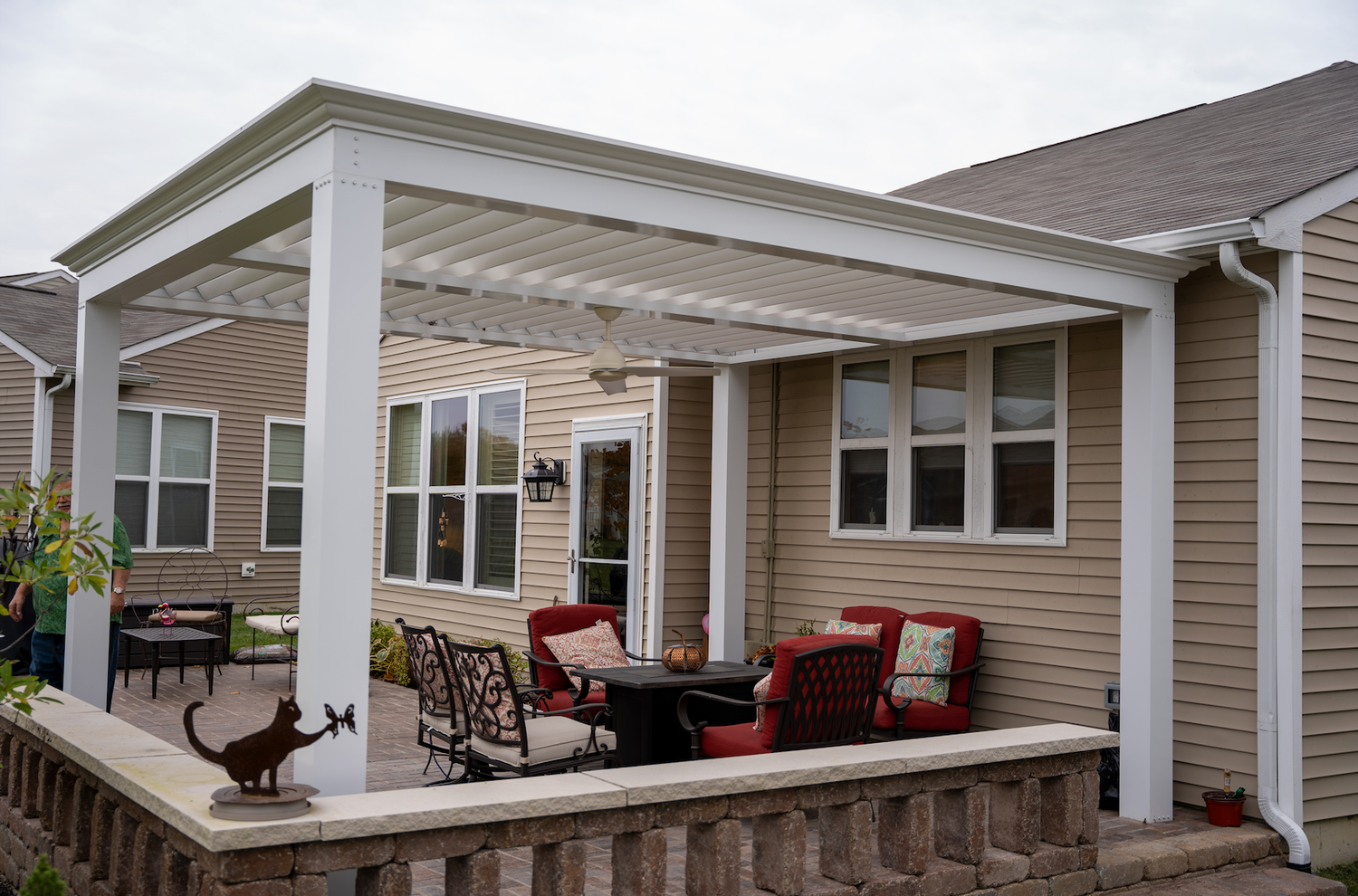 free standing luxury pergola with louvered roof on deck