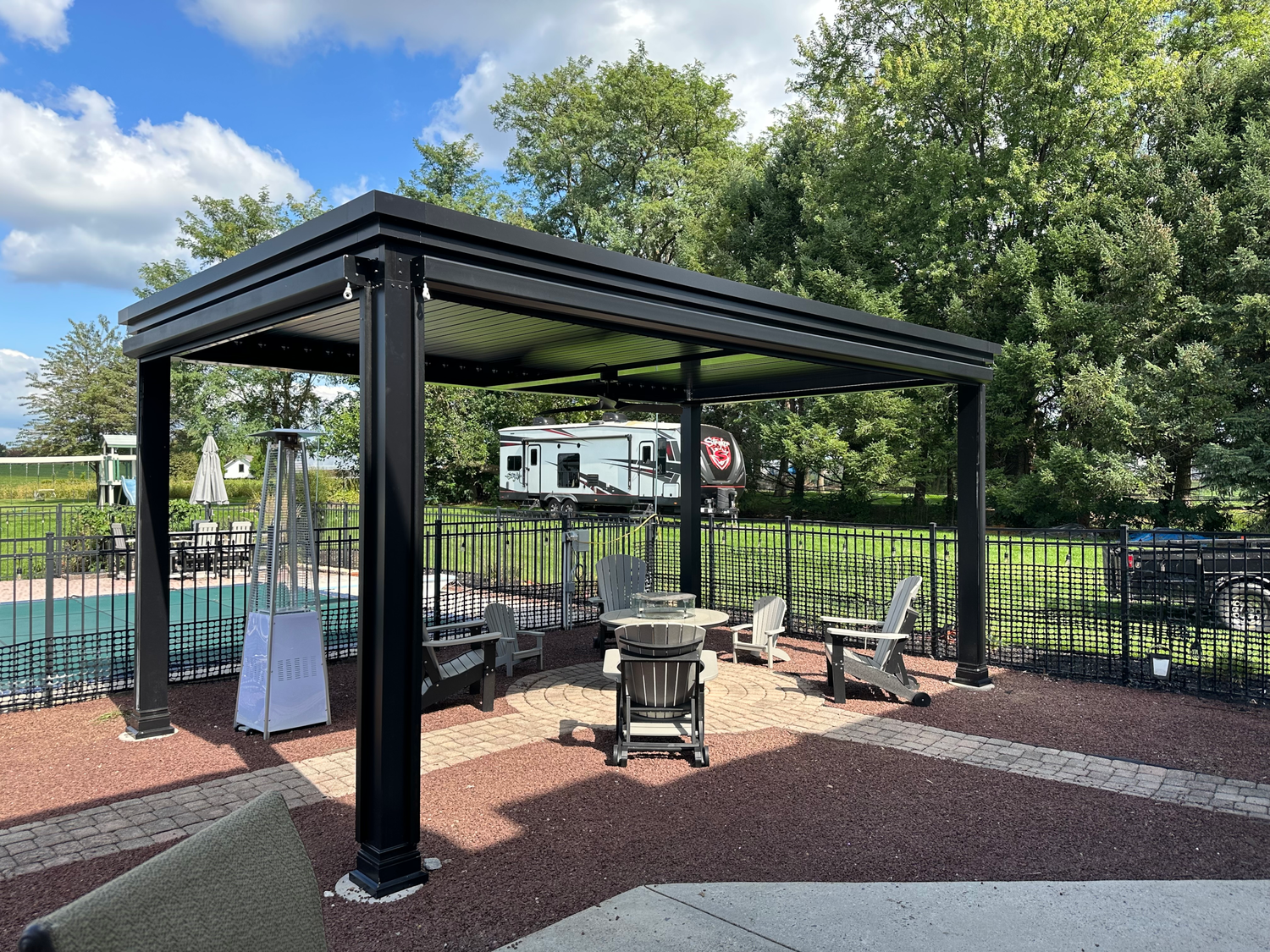 free standing luxury poolside pergola with louvered roof