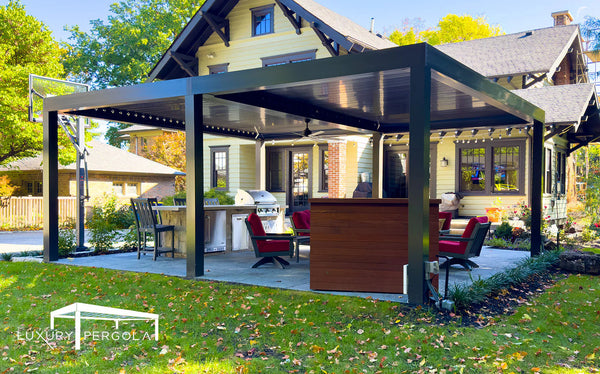 Black pergola with LED lighting on traditional home
